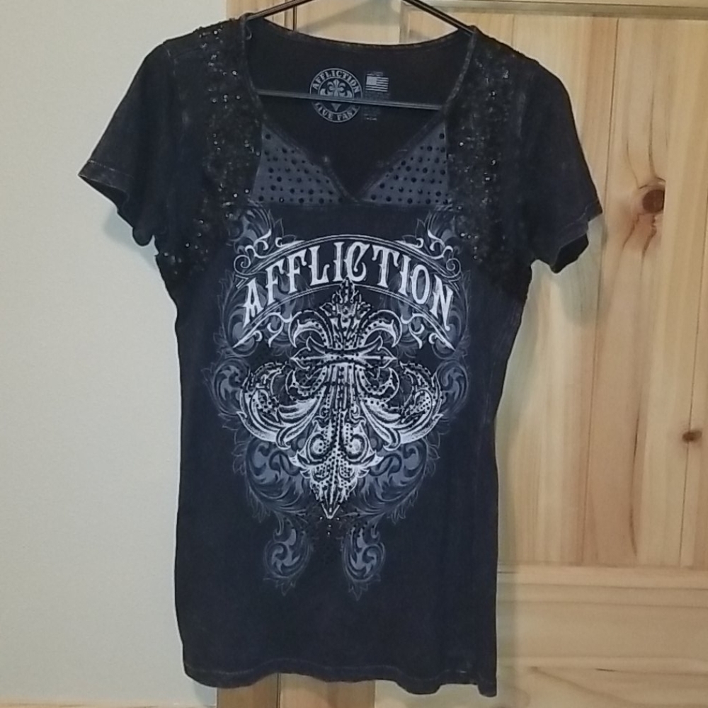 Affliction T-shirt size Lg but fits like a Med